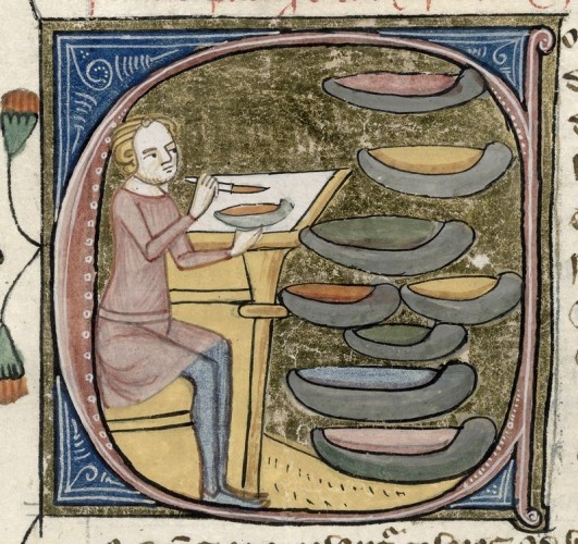 Medieval artist and his paints