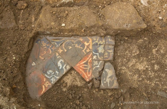 In situ tile floor possibly joining on to the rear wall of the choir near Richard III's grave. Photo credit: University of Leicester