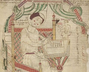 Donatus writing his grammar, his ink-pot held by a monk labelled 'Heinre' - from British Library Arundel 43   f. 80v