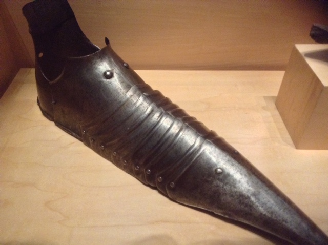 Armoured shoes: This late 15th century metal sabatons were part of a complete suit of armour. The narrow strips of metal would have helped the man secure his foot in a stirrup while riding.