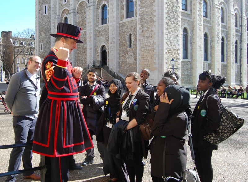 Yeoman Warder speaking to a group of school children at the Tower of London. Photo courtesy of Represent London, lotterygoodcauses.org.uk.
