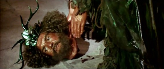 The Green Knight re-attaching his head after Gawain has lopped it off.